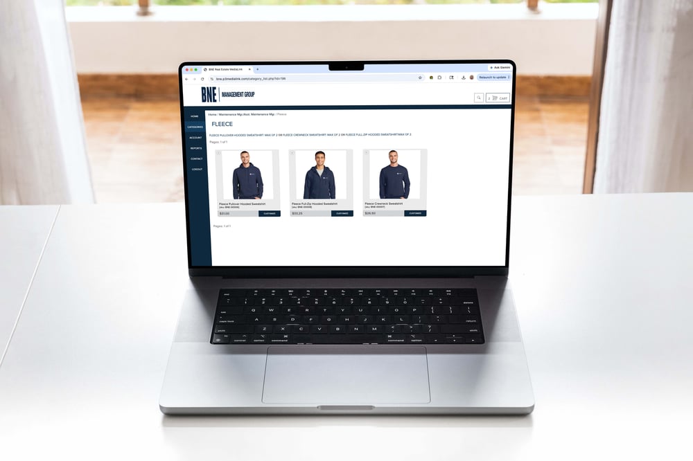 A laptop with an image of a company storefront