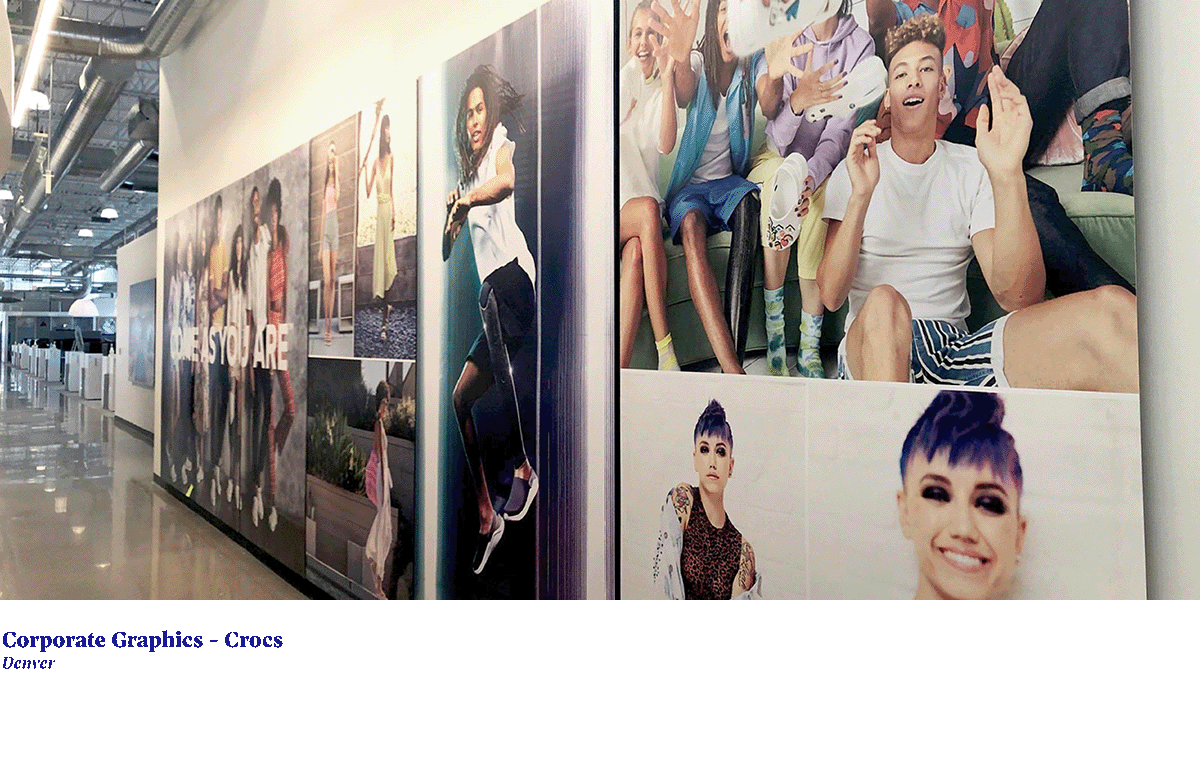 wall graphics of young smiling people on office wall at crocs headquarters
